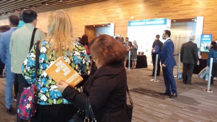 long line of people waiting to meet Sandra McDowell at Toastmasters convention